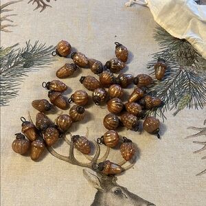 35 small copper brown ornaments